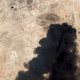 This Saturday, Sept. 14, 2019, satellite image from Planet Labs Inc. shows thick black smoke rising from Saudi Aramco’s Abqaiq oil processing facility in Buqyaq, Saudi Arabia.
